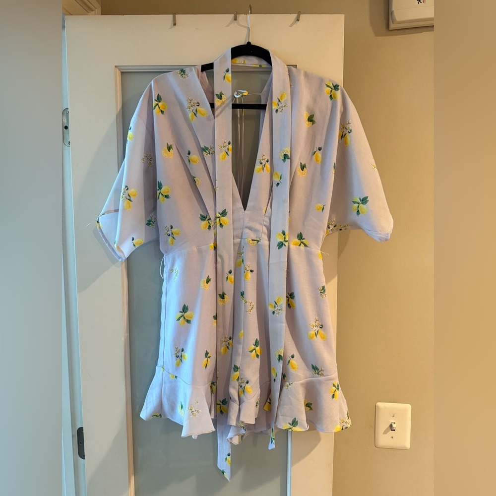 Light purple romper with lemons